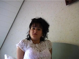 Horny girl lays in bed finger fucking herself and stroking clit