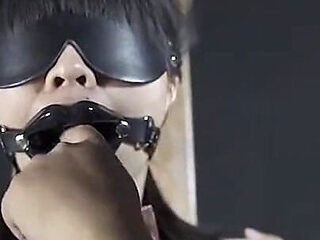 Xr61-the Girl Was Tied to a Pillar and Gagged with a Gag; She Kept Moaning and Groaning