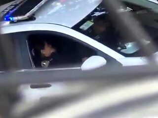Female Officer Cums in Squad Car