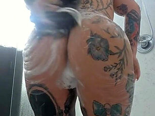 Tattooed Slut Soaps up in the Shower