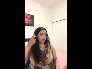 Indian woman takes on a big black cock, moaning as she rides it.