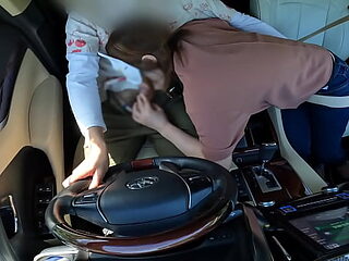 Married Asian MILF gives a hot blowjob in a car