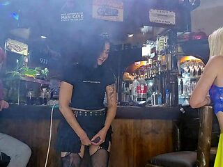 Girls fucking each other with strapless dildo while husbands watch