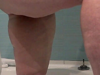 A Bathroom Camera Watches a Mature Wife. a Busty MILF Shaves Her Legs. PAWG.