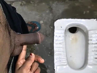 Desi Bhabhi Holding Stepbrother-in-law's Penis and Making Him Pee and Peeing Herself