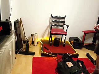Curvy Brunette Dominatrix Commands Bound Slave in Fetish Dungeon