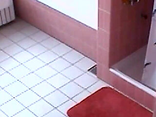 Amateur blonde masturbates on toilet