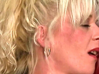 Huge-titted German MILF rides big cock in the office