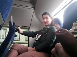 MILF gets seduced into sucking and jerking his big dick on a public bus