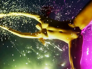 Young girl reveals her slit under the water