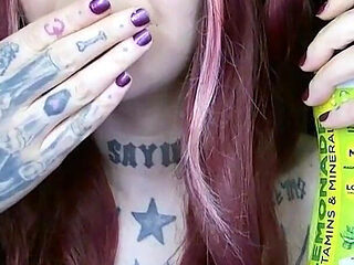Sexy Alternative Redhead Drinking Soda and Burping