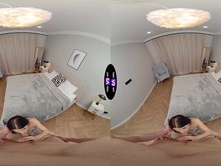 Petite brunette takes it all in a VR scene