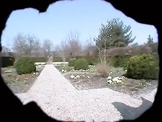 Solo milf masturbates outdoors in the park with big natural tits