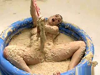 Kymberly Jane - Kym pleasures herself in a pool of oatmeal.