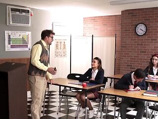Classroom action with two hot babes and one girthy dick