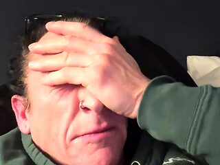 Goddess Kandy sneezes while resting in a classic hotel bed