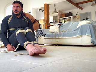 Latina Finds Every Tickling Spot on Her Sub While He Is in a Strict Hogtie