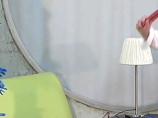 College Girl's Game of Hitting Clothespins with a Whip to Remove Them